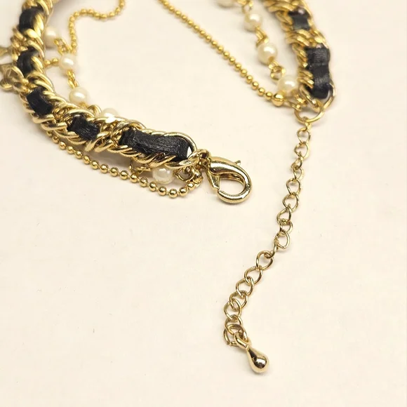 Goldtone Triple Strand Star Charm Bracelet - Picture 7 of 7